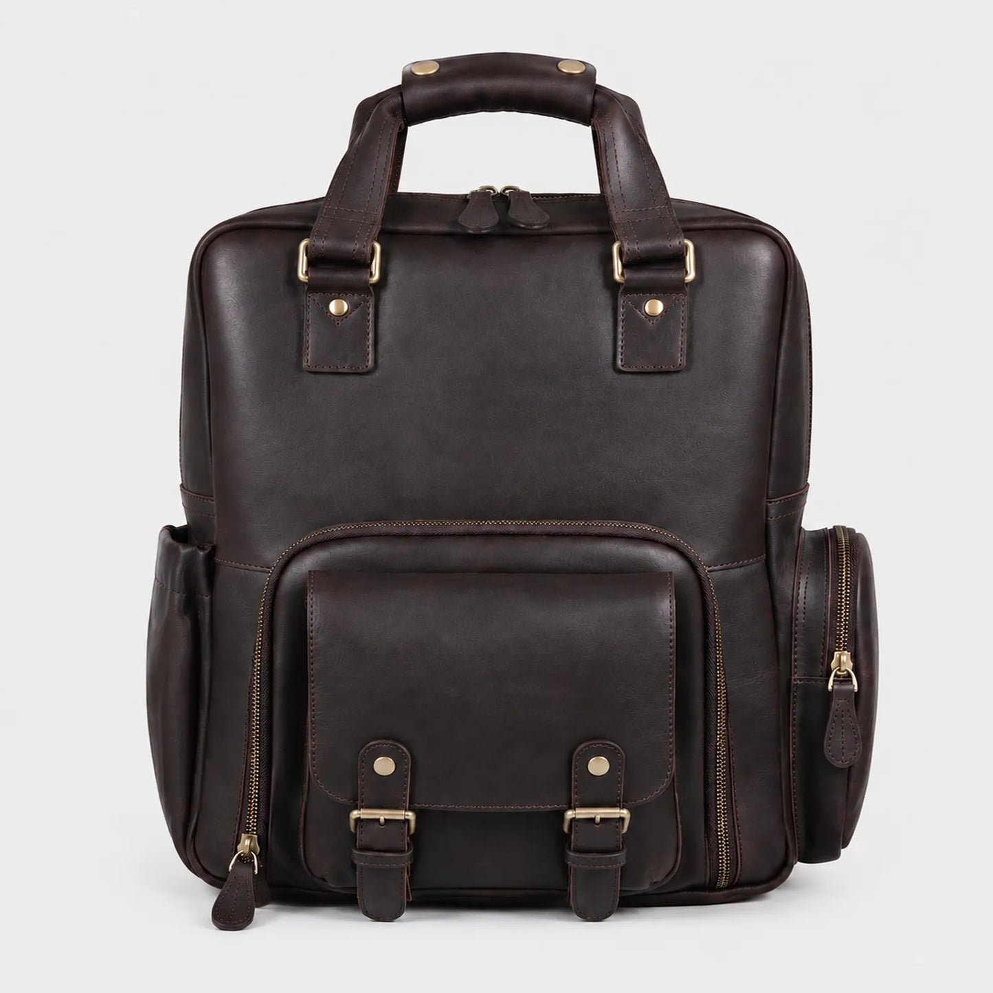 Handcrafted brown leather camera backpack with padded DSLR compartment and laptop sleeve