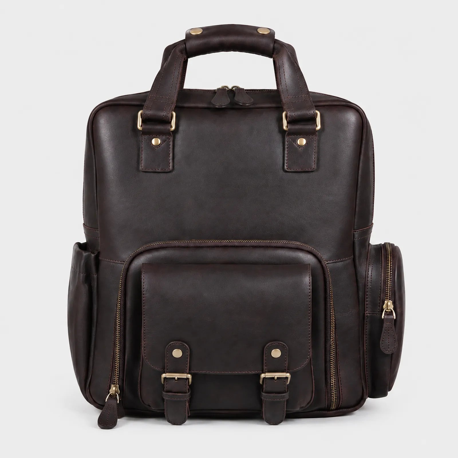 Handcrafted brown leather camera backpack with padded DSLR compartment and laptop sleeve