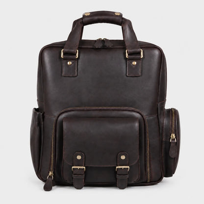 Handcrafted brown leather camera backpack with padded DSLR compartment and laptop sleeve