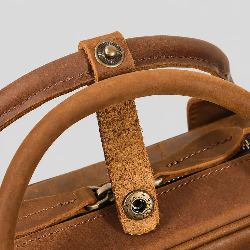 Leather handle detail on briefcase