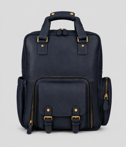 Navy blue Crazy Horse leather camera backpack on a light gray background, front view showing top handle, front flap pocket with buckles, side pocket, and durable brass hardware. Suitable for DSLR cameras, laptop, and travel essentials.