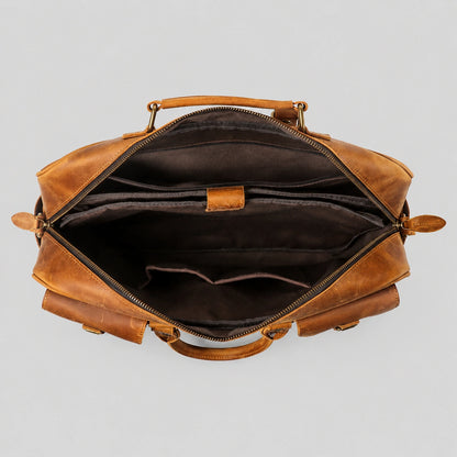 Interior view of leather briefcase showing spacious laptop compartment and organizational pockets
